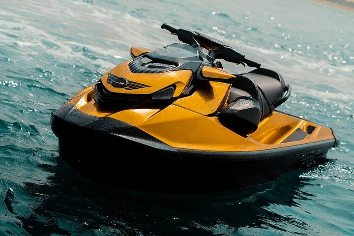 Experience the ultimate jet ski adventure in Dubai gliding through warm Persian Gulf waters while marveling at iconic landmarks like Burj Al Arab and Palm Jumeirah. Unforgettable views await!